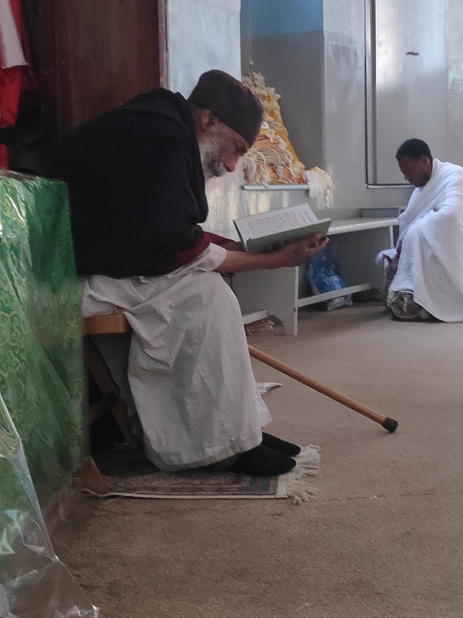 Ethiopian elder reading